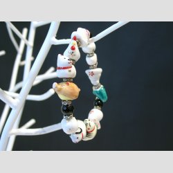 Kinesisk Nytr - 12 rsdyr Armbnd - Med Sort Koral Perler og Glas Krystal Diamanter