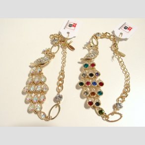 Armbnd - Forgyldt Pfugl Med Hvide eller Farvet Glasdiamanter